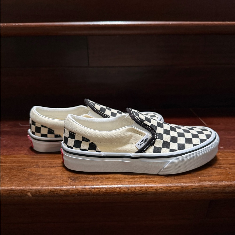 Kids Vans slip-on checkerboard shoes